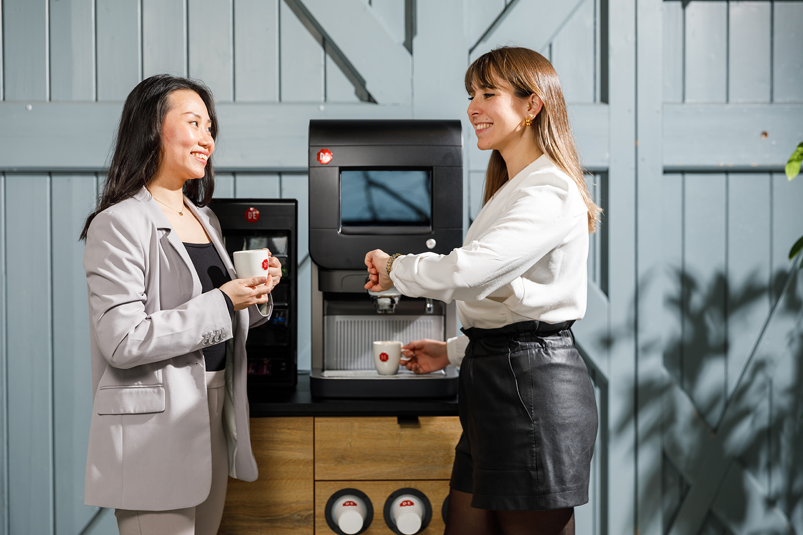 Cafitessemachine met koffietas